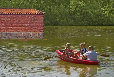 Three in a Rowboat