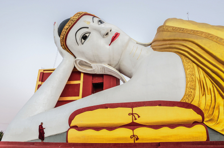 Reclining Buddha Statue with Novice