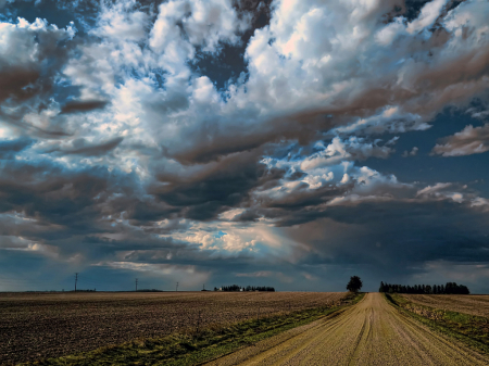 A Beautiful Sky Over A Country Road