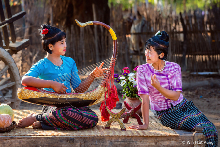 Playing Burmese Harp