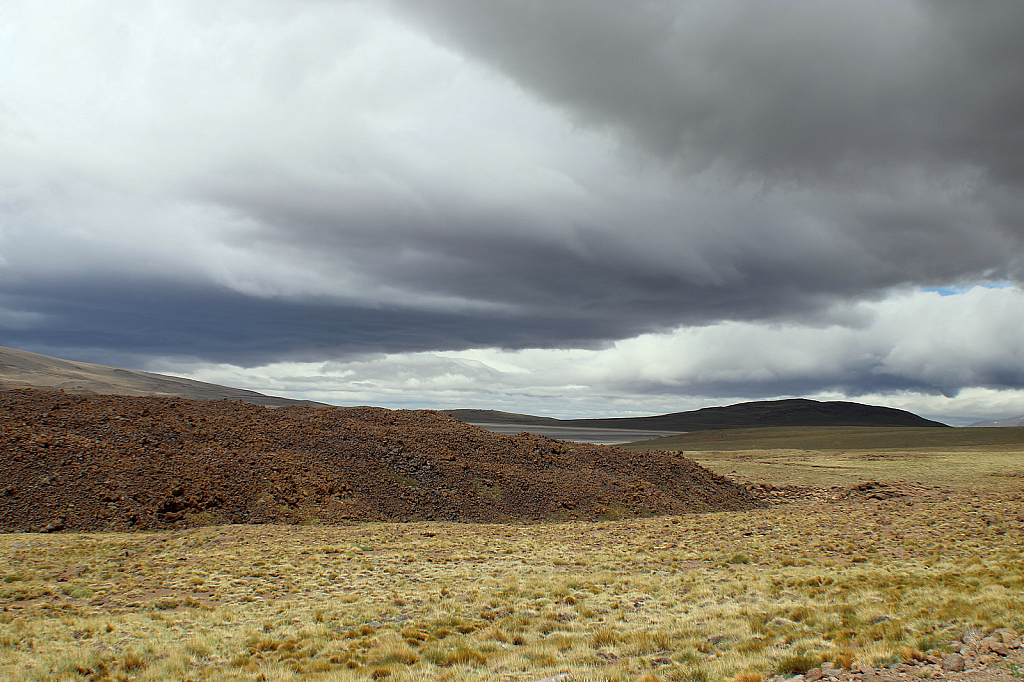 Stormy sky at the foot of Tromen volcano