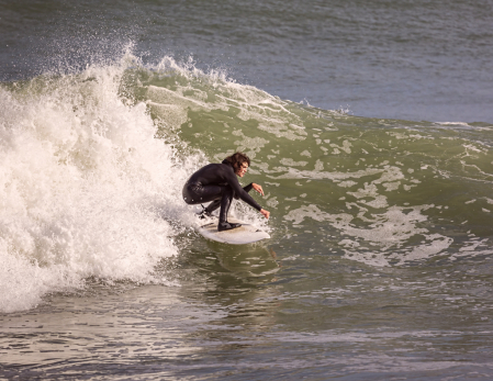 Surfing at Peggoty Beach