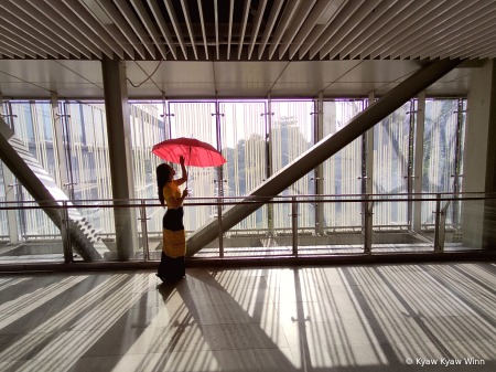 The Girl With Red Umbrella