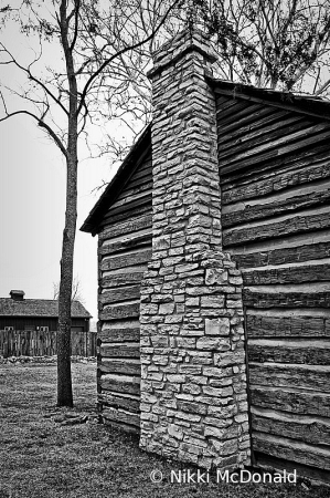 Stone Chimney and Log House