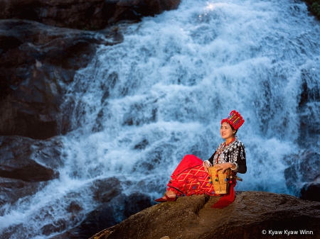 Waterfall and Kachin lady 