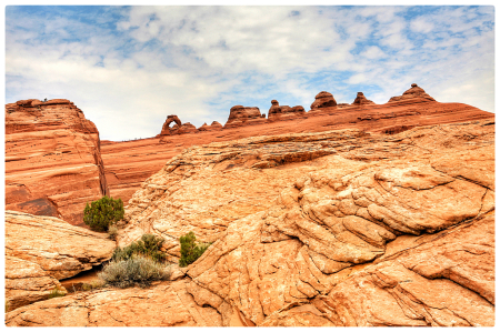 Arches, zoom in to see the people