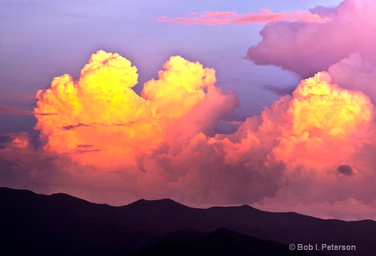 sun sets on thunderheads