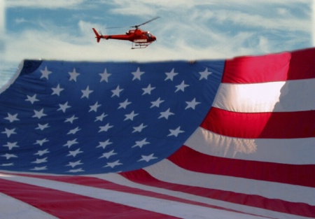 Composite of new sky, helicopter and flag 