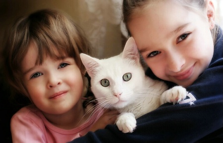 Sisters with their Kitty