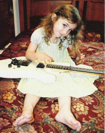 With daddys guitar