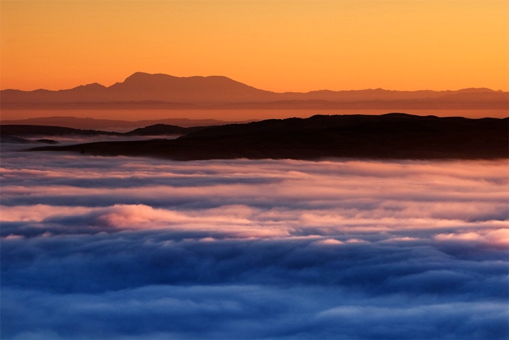 Sunrise over blanket of fog