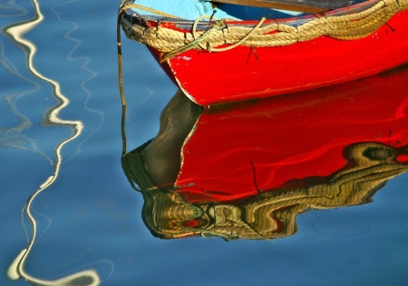 Red Skiff Reflections