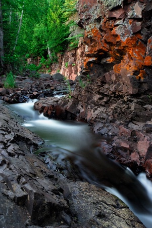 'Secluded Orange Falls'