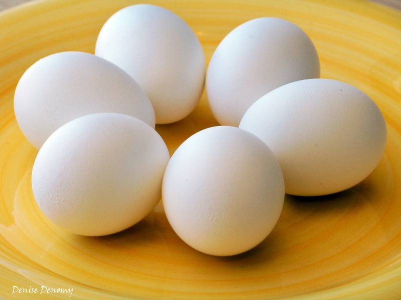 EGGS ON YELLOW PLATE