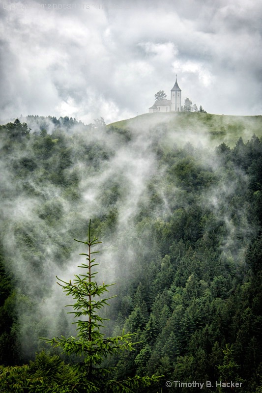 Kropa Church In Clouds