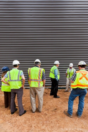 Thoughtful Contemplation of a Metal Wall