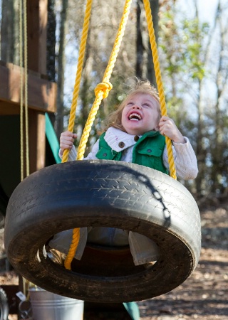 Joy On The Tire Swing