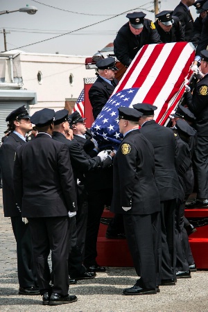 Pallbearers Receive Casket From Honor Guard