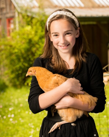 Girl and Her Chicken