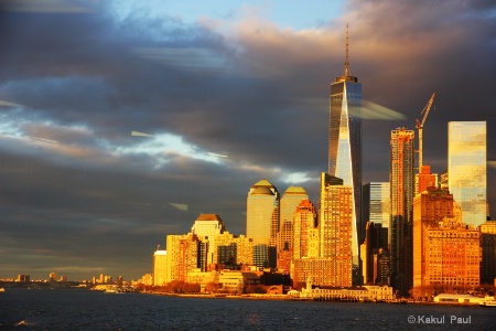 Setting sun glowing the Manhattan glass walls