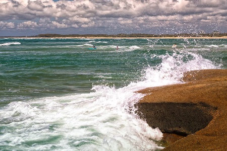 Waves Splash On The Rocks