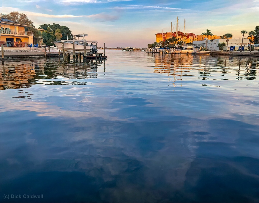 Cloud reflections. Image by Dick Caldwell