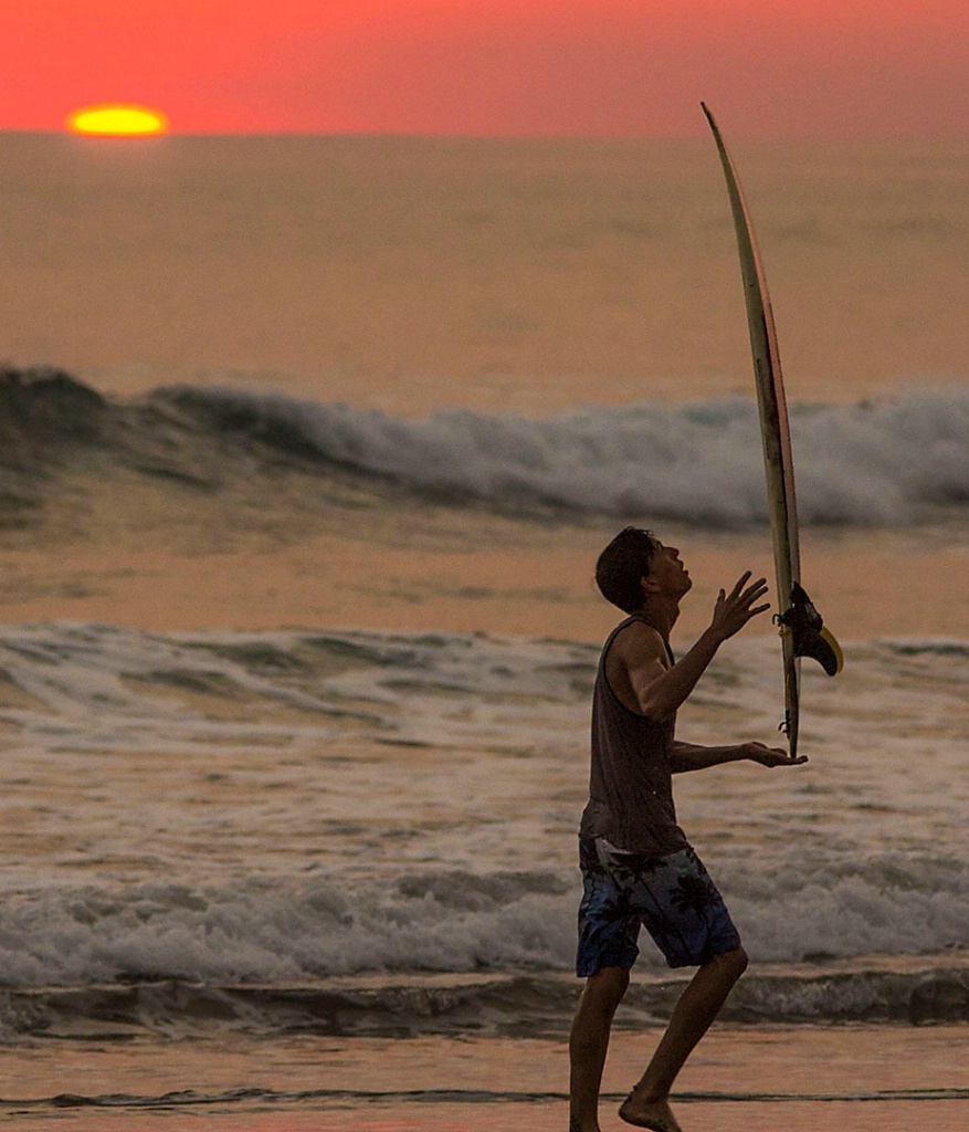 Balancing Surfer with board